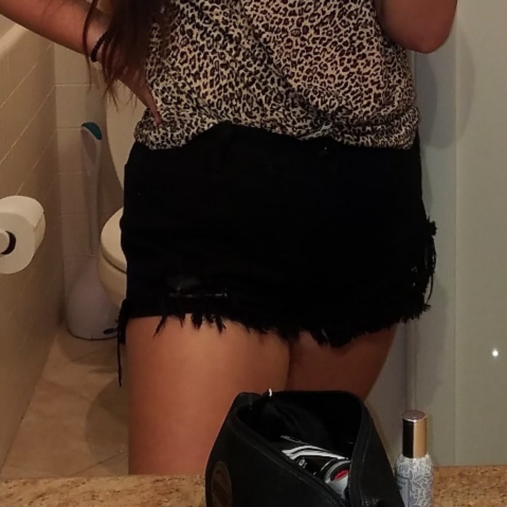 black ripped jean shorts